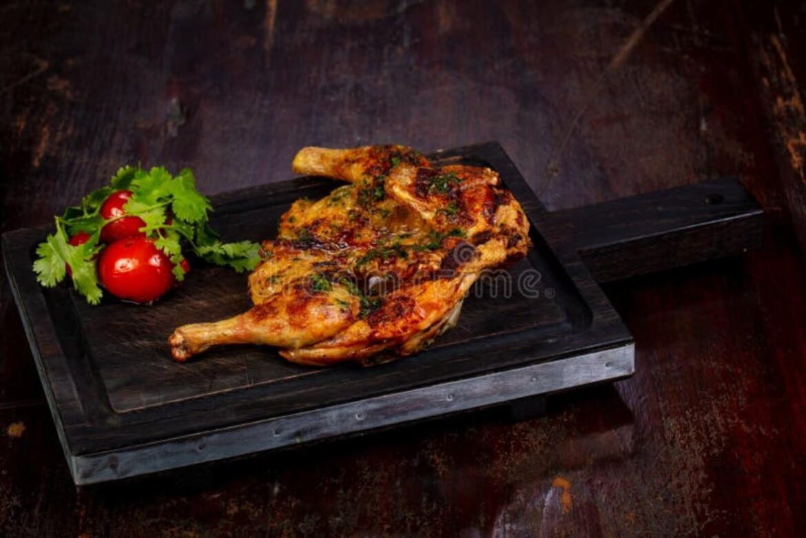 grilled-chicken-spices-over-wooden-121894141